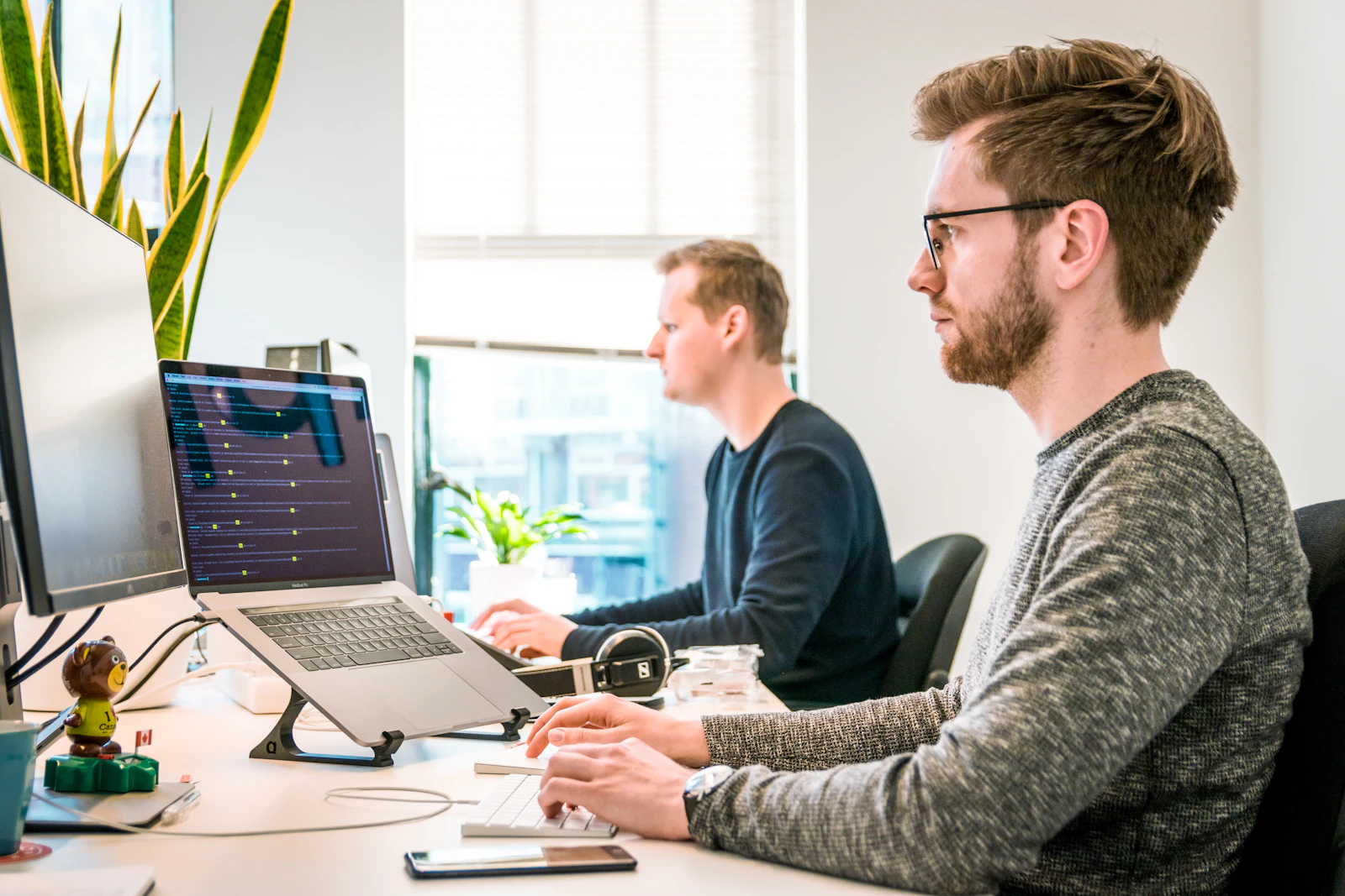 IT team collaborating in a professional office